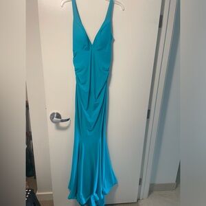 La femme. Size 6. Turquoise dress. Gorgeous ruching